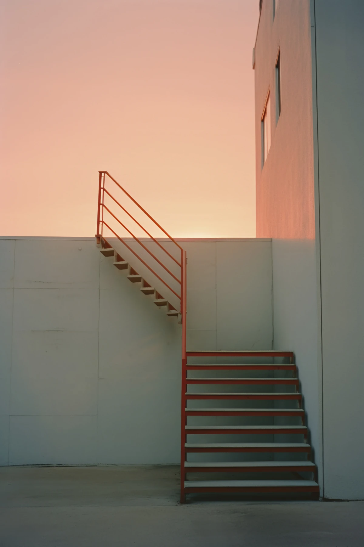 Minimal architectural stairway in warm evening light